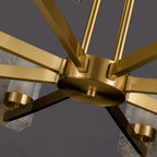 Underside of the Clérachic Meridian Alabaster Chandelier, eight flat brass spokes radiating from the round central hub.