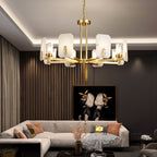 Clérachic Meridian Alabaster Chandelier lit in a dark-panelled lounge, its warm heads set against charcoal walls and a framed print.