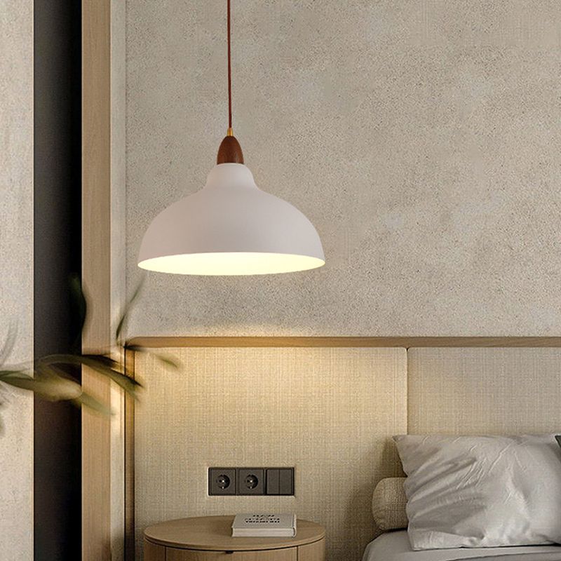 Clérachic deep bowl pendant in white, a metal shade held in a wire yoke