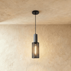 Clérachic narrow black mesh cylinder pendant, 10 cm wide and 35 cm tall, with a grey top section and filament bulb