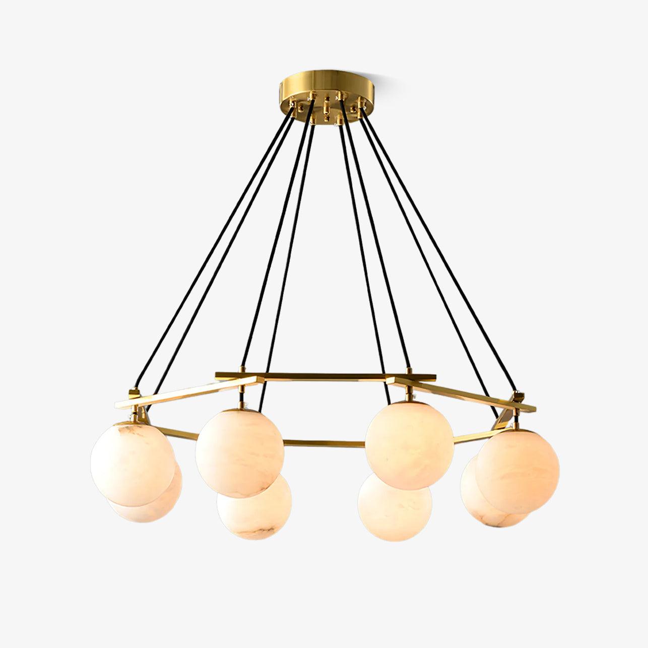 The seven-orb Clérachic Miira chandelier, globes staggered around the brass armature.