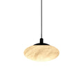 Clérachic Mini Discus pendant light on white, showing the domed alabaster shade, black cap and slim round cord.