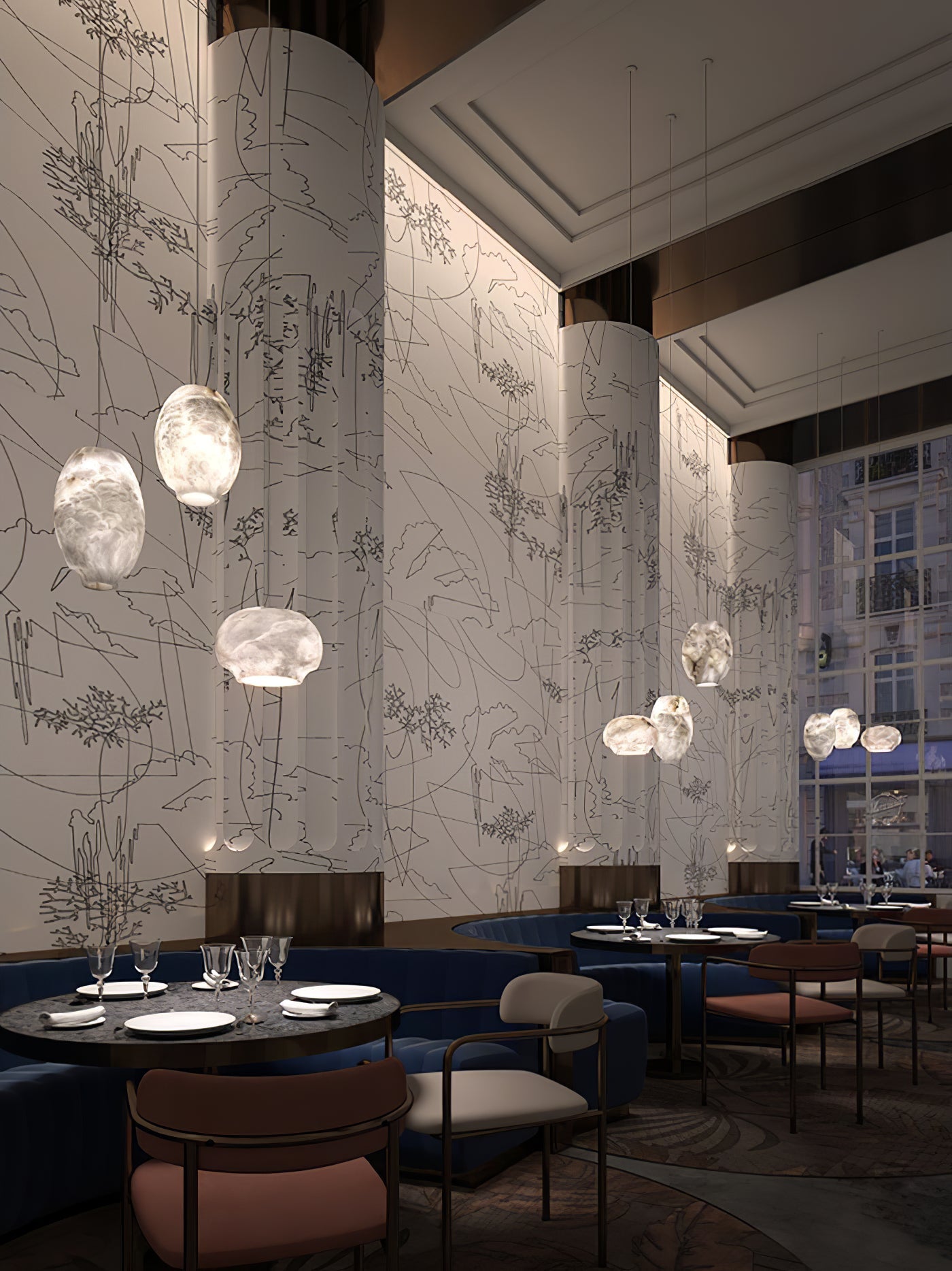 Clérachic alabaster pendants hung through a restaurant interior with blue banquette seating.