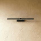 Clérachic slim black linear wall light, 39.5 cm, switched off against a textured limewash wall, showing its square mount.