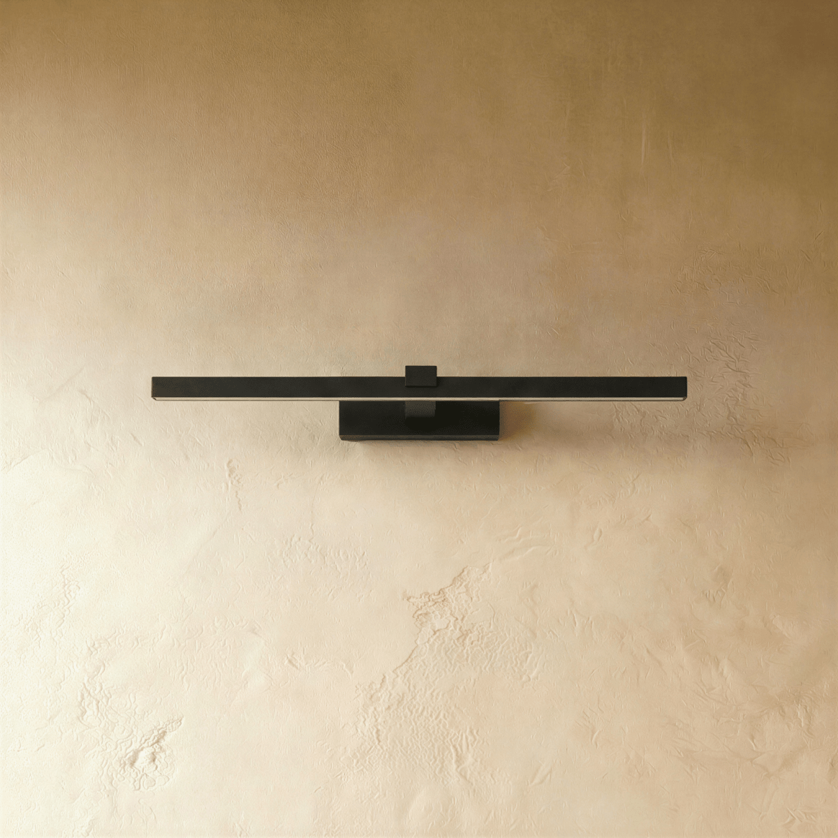 Clérachic slim black linear wall light, 39.5 cm, switched off against a textured limewash wall, showing its square mount.