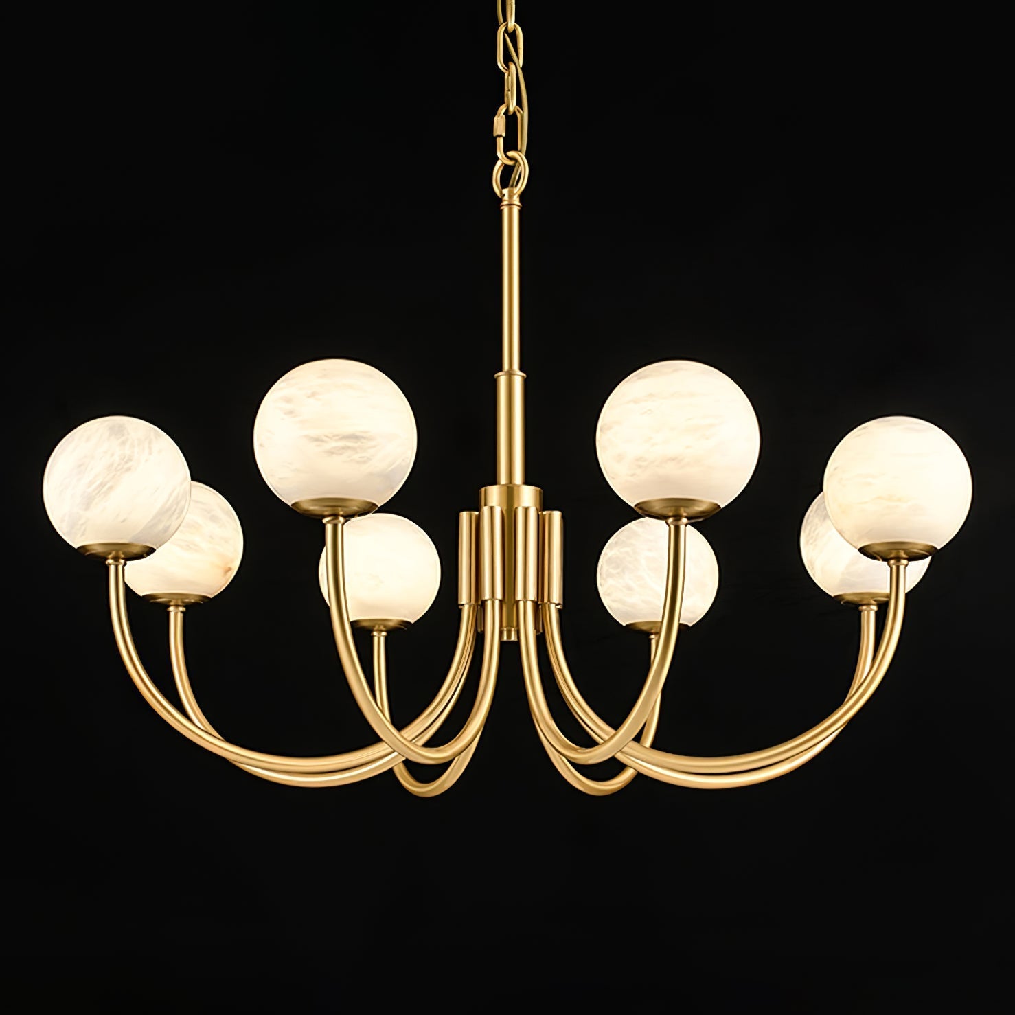 Clérachic alabaster globe chandelier on black, eight brass arms curving out beneath a slim chain.