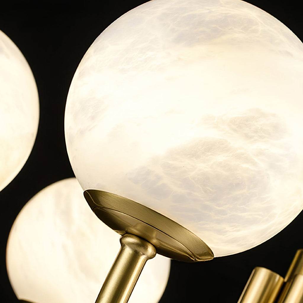 Macro of a single Clérachic alabaster globe, the stone veining catching light across its surface.
