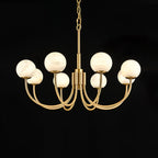The Clérachic globe chandelier centred on black, brass arms symmetrical around the stem.