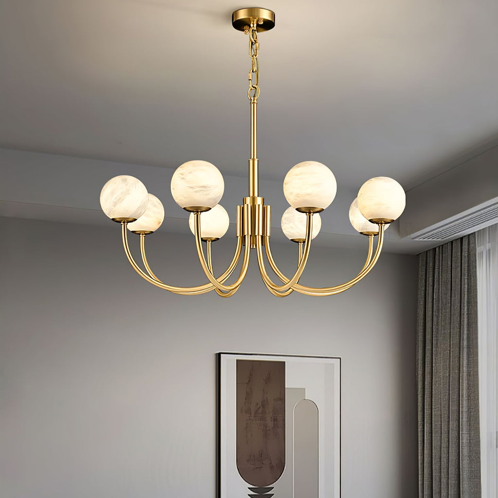 Clérachic globe chandelier lit in a pale room with drawn curtains and a framed print behind.