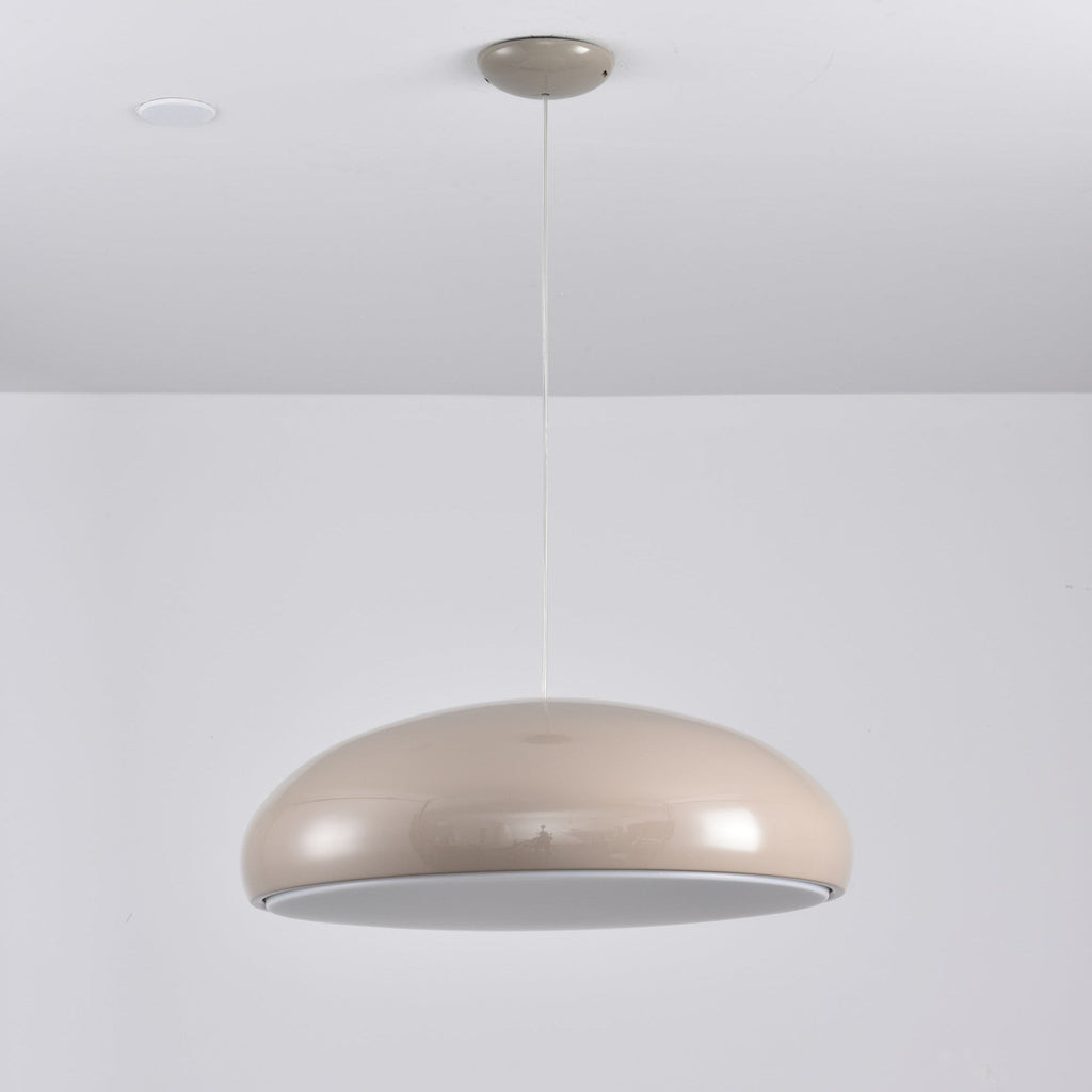 Warm grey Clérachic dome pendant viewed slightly from below, its unlit grey diffuser visible inside the rim.