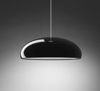 Gloss black Clérachic dome pendant on a grey gradient backdrop, its white inner rim showing at the lower edge.