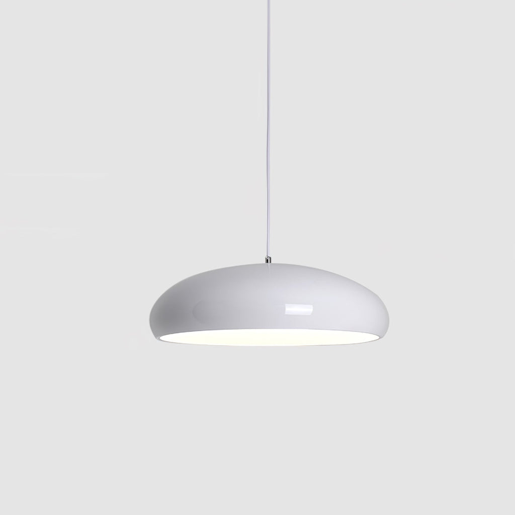White Clérachic dome pendant on a light grey backdrop, with a softly glowing underside and a slim white cable.