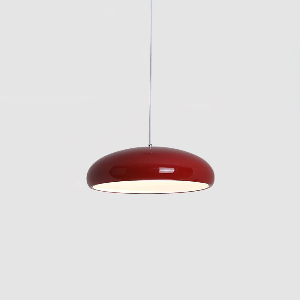 Small dark-red Clérachic dome pendant on a light grey backdrop, hung from a thin white cable.