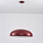 Dark-red Clérachic dome pendant seen from slightly below, its pale inner shade just visible under the shell.