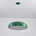 Green Clérachic dome pendant viewed from below, with an unlit grey diffuser disc inside its rim.