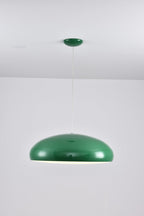 Smaller green Clérachic dome pendant on a pale backdrop, hung from a green canopy with a thin cable.