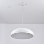 White Clérachic dome pendant viewed from beneath, its grey diffuser disc unlit inside a white rim.