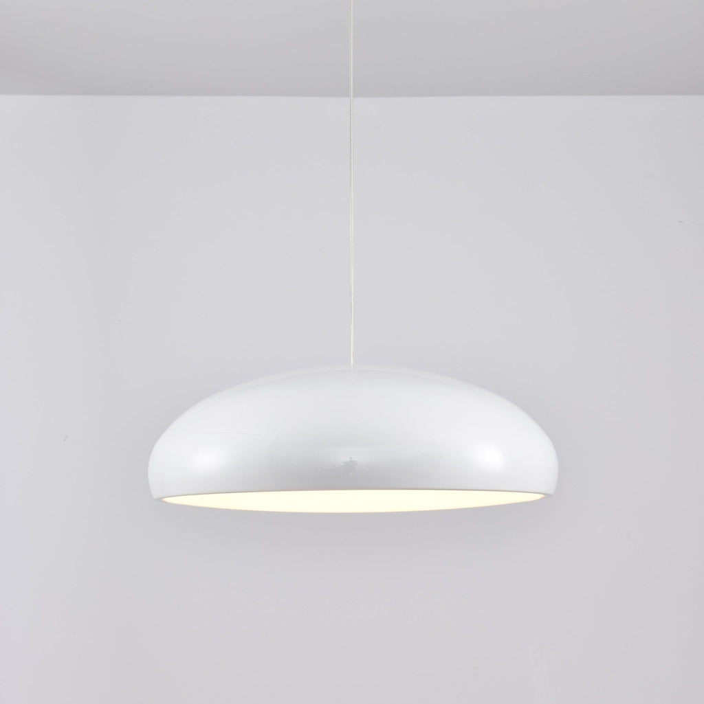 White Clérachic dome pendant, side view, with a glossy shell and a soft glow under its rim.