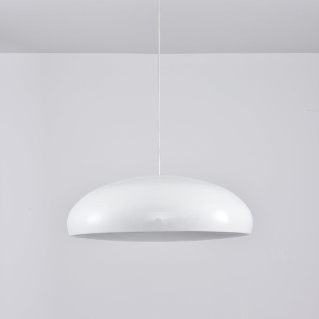 White Clérachic dome pendant viewed from slightly below, its grey inner disc unlit and its shell glossy.