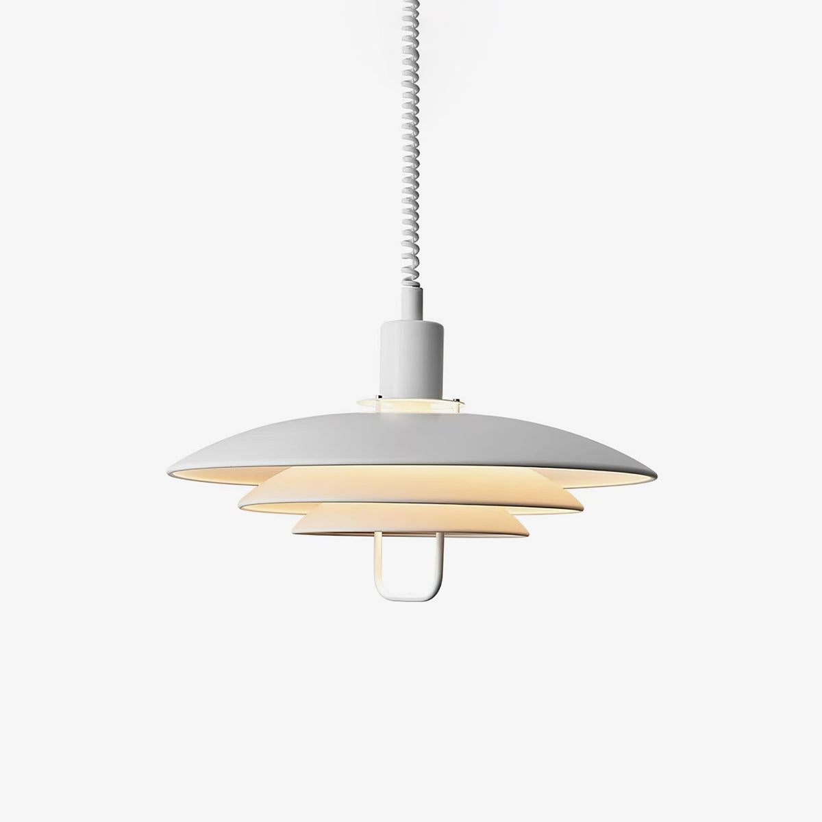 White three-tier Clérachic pendant on a plain light backdrop, with a white coiled cable and a small loop handle under the lowest shade.