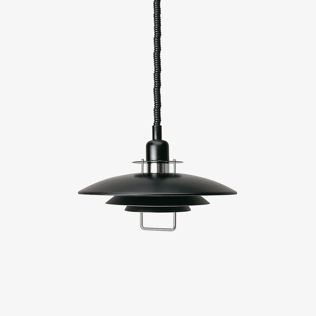 Black Clérachic pendant on a pale grey backdrop, with a black cable and a metal loop handle under the bottom shade.