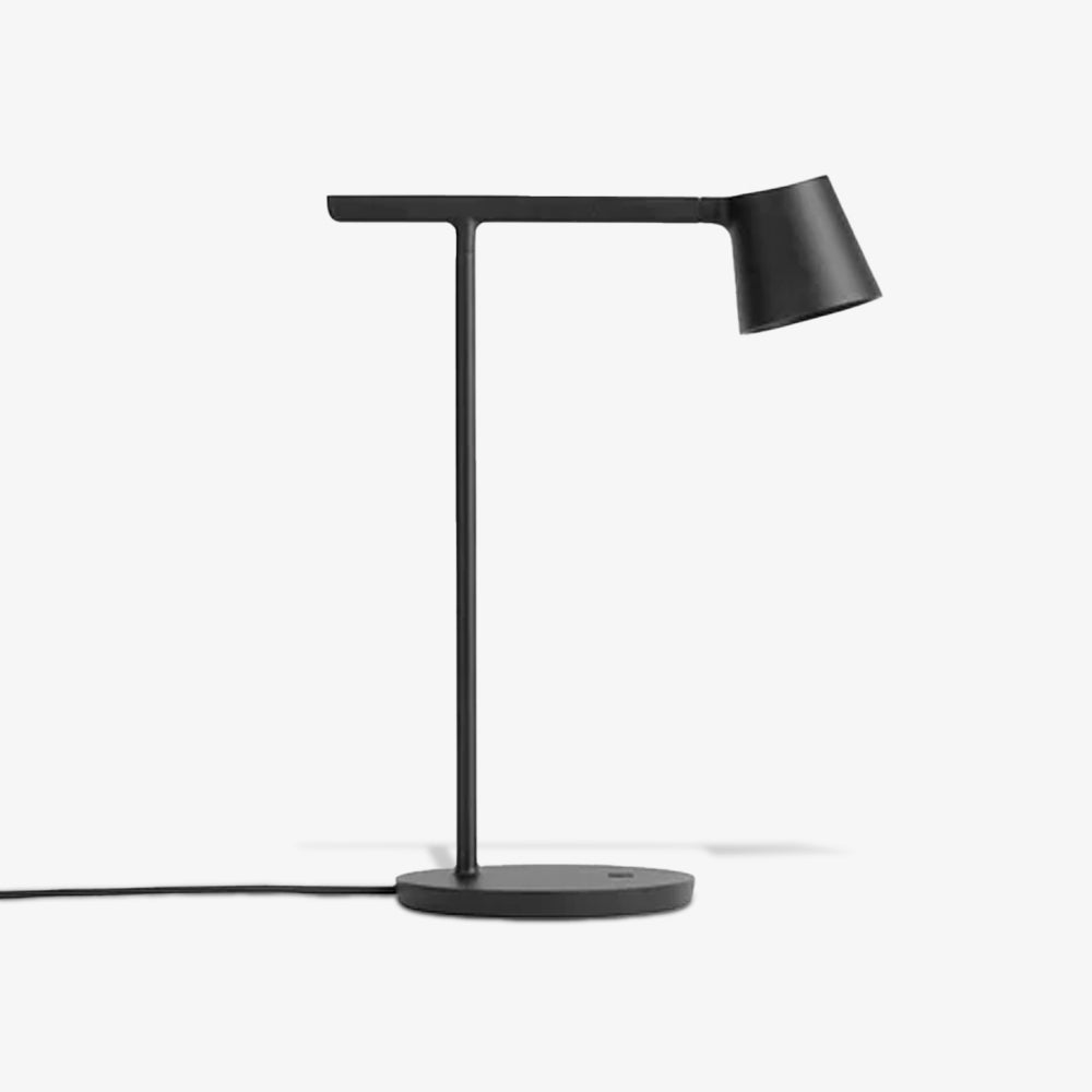 Black Clérachic table lamp on a white backdrop, seen side-on with its cord running out to the left.
