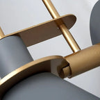 Detail of the Clérachic Morandi horn-shade wall sconce's slotted brass bracket, the joint that lets the cone tilt on its arm.