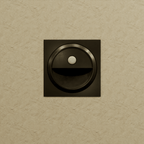 Clérachic black square stair light unlit on a textured sand-coloured wall, with its round sensor above the recess.
