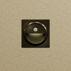 Clérachic black square stair light on a textured sand wall, giving off a faint glow from its half-moon recess.
