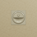 Clérachic pale square stair light on a textured sand wall, unlit, showing its round sensor and curved recess.