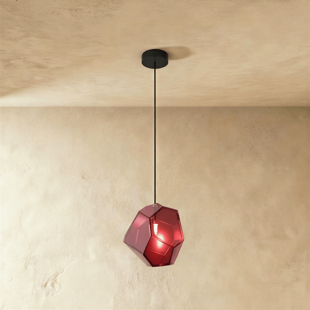 This Clérachic pendant's rose red faceted glass glows from within, the bulb visible through its angled panes.