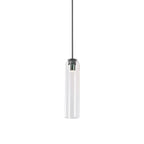 Clear glass tube shade of the Clérachic pendant lit on a black rod, the black bulb housing visible through the glass.