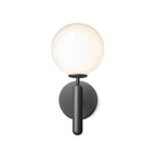 This black Clérachic wall light shows its round white glass globe against a plain white background.