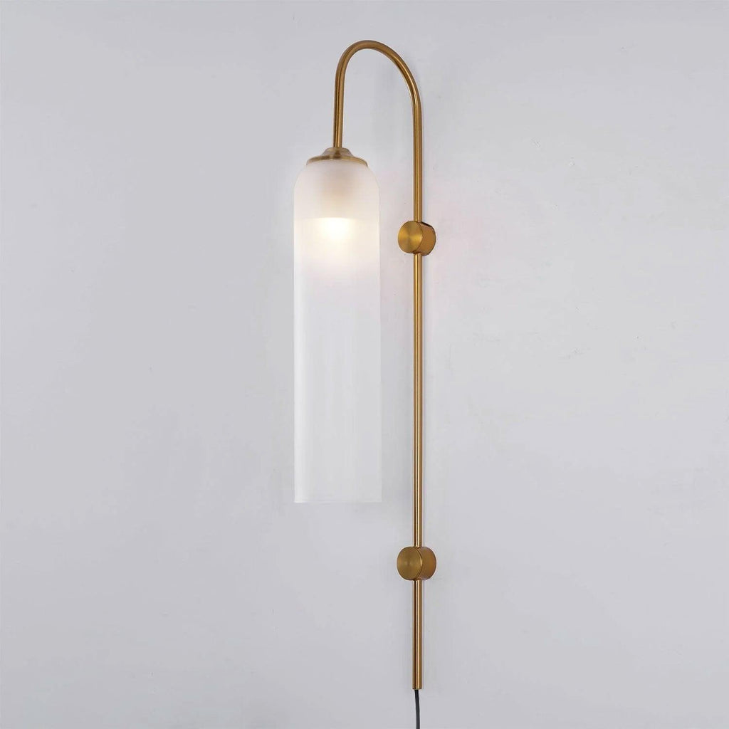 Milky white glass on the Clérachic mouth-blown wall sconce, diffusing the bulb into an even glow along the whole cylinder.