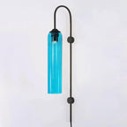 Sky blue glass on the black Clérachic mouth-blown wall sconce, seen full length from the gooseneck down to the lower mount.