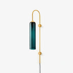 Clérachic mouth-blown glass wall sconce in deep teal on polished gold, unlit, shown against a soft off-white ground.