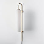 Clérachic mouth-blown glass wall sconce in frosted white, seen at an angle so the rod and both disc mounts line up.