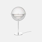 Gloss white shades meet a polished chrome ring on this Clérachic table lamp in White & Chrome, shot against a plain backdrop.
