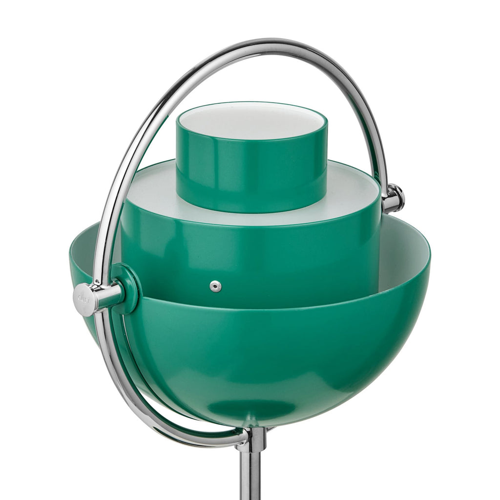 The Clérachic lamp's upper shade rotated back, the chrome ring standing clear as a carry handle.