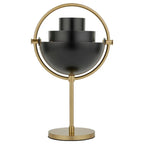 Clérachic table lamp in matt black with a brushed brass ring, the upper shade rotated back to open up the light.