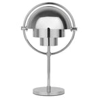 Clérachic rechargeable table lamp in polished chrome throughout, the mirrored shades catching the room.