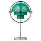 Clérachic rechargeable table lamp in deep green with a polished chrome ring, shades closed into a sphere.