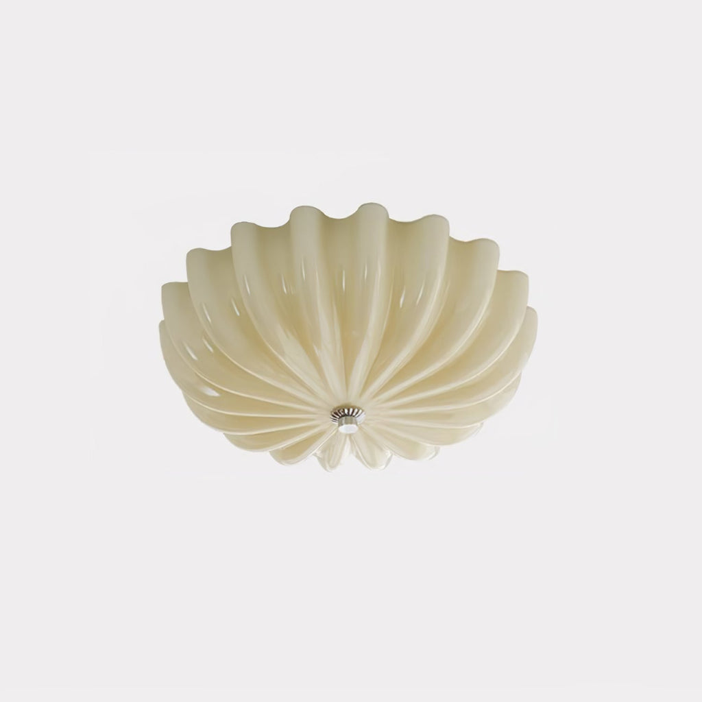 The beige version of the Clérachic Murano-Style Scalloped Glass Flush Ceiling Light, unlit, its buttery petals shown against plain grey.