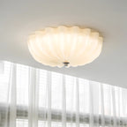 Clérachic Murano-Style Scalloped Glass Flush Ceiling Light mounted flush on a white ceiling above a bright, sheer-curtained window.
