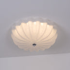 Clérachic Murano-Style Scalloped Glass Flush Ceiling Light lit on a grey ceiling, the craquelé web spreading the glow across the petals.