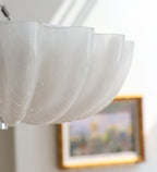 Close-up of the Clérachic Murano-Style Scalloped Glass Flush Ceiling Light, fine craquelé threading visible through each blown glass petal.