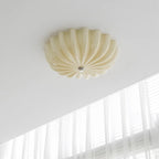 Clérachic Murano-Style Scalloped Glass Flush Ceiling Light in beige, unlit on a white ceiling above a wall of sheer curtains.