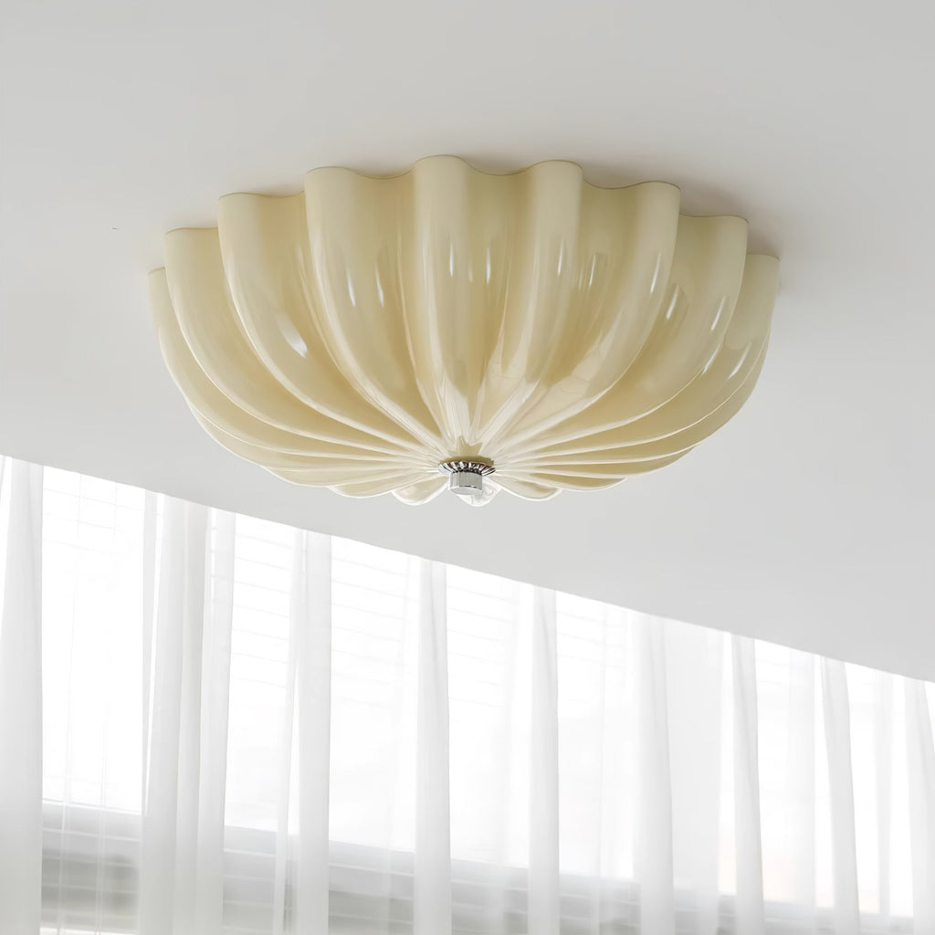 Clérachic Murano-Style Scalloped Glass Flush Ceiling Light in beige seen close up on the ceiling, petals curving to a small chrome centre.