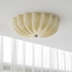 Clérachic Murano-Style Scalloped Glass Flush Ceiling Light in beige seen close up on the ceiling, petals curving to a small chrome centre.