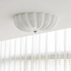Clérachic Murano-Style Scalloped Glass Flush Ceiling Light in white, fitted at a ceiling edge above floor-length sheer curtains.